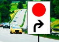 Panneau au point rouge : signification cruciale pour les conducteurs sur les routes d’Europe